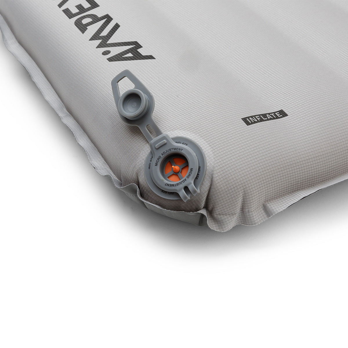 Close-up of valve partially open, showing the orange interior inflation mechanism.