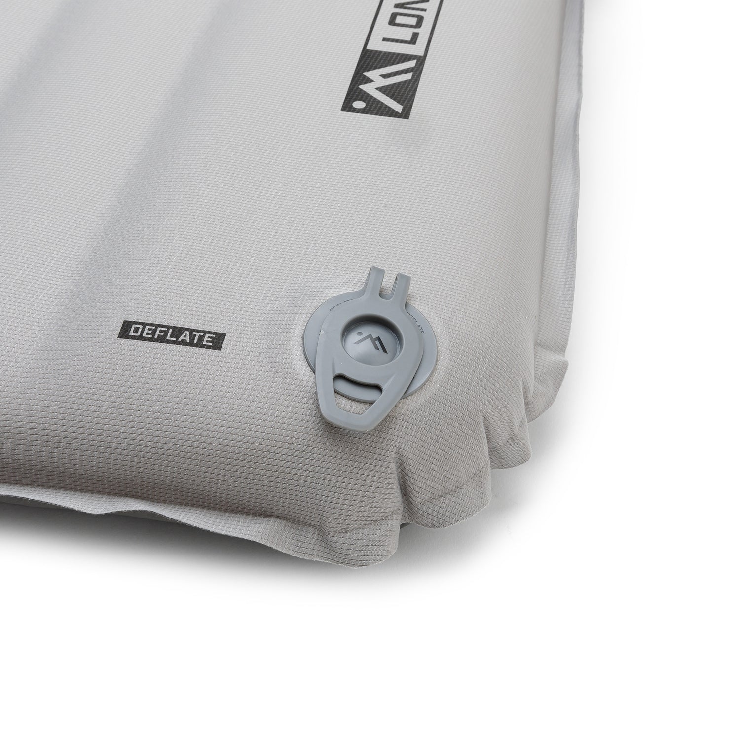 Close-up of the gray Ampex sleeping pad with the deflation valve in the closed position.