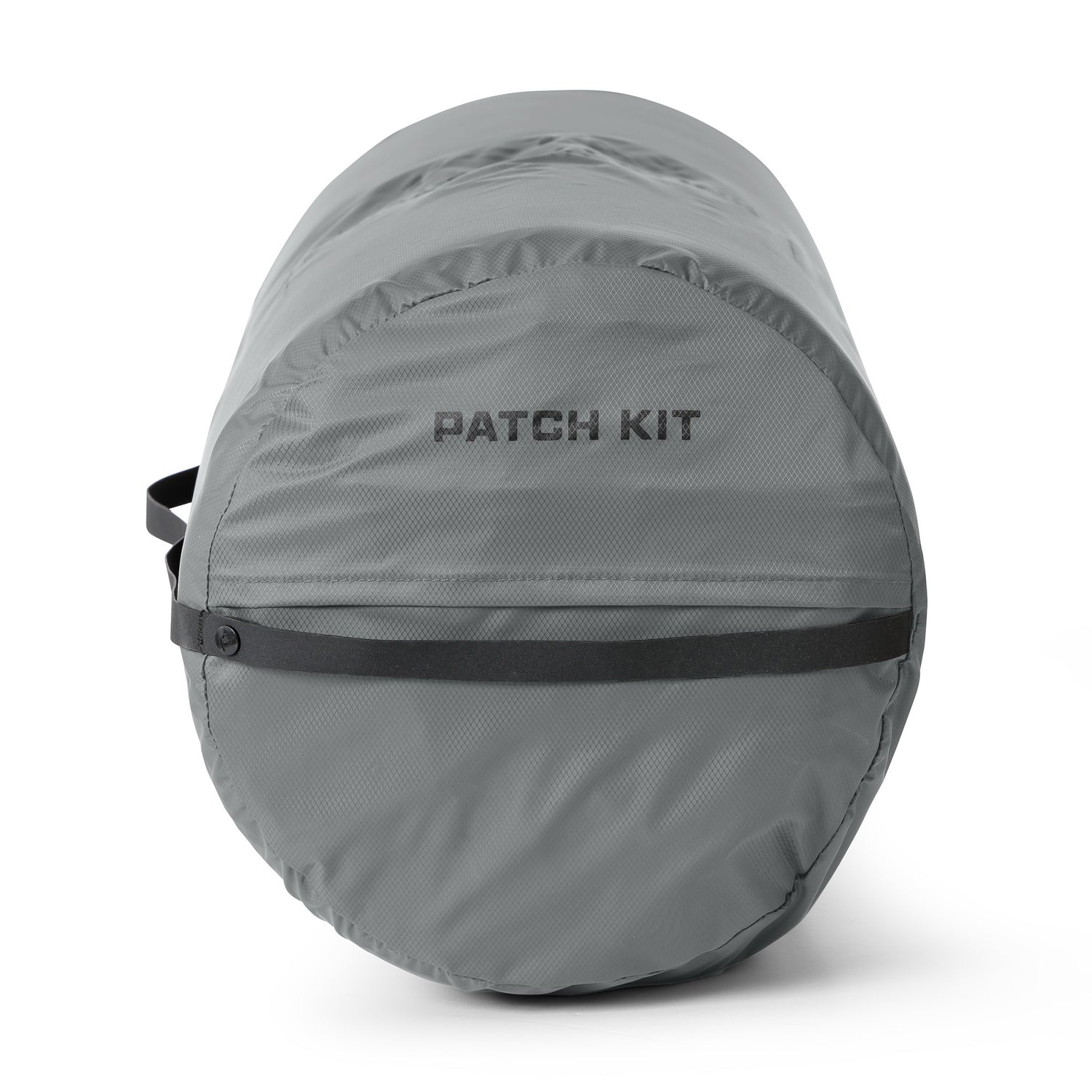 Rolled sleeping pad with Ampex logo packed into a gray stuff sack.