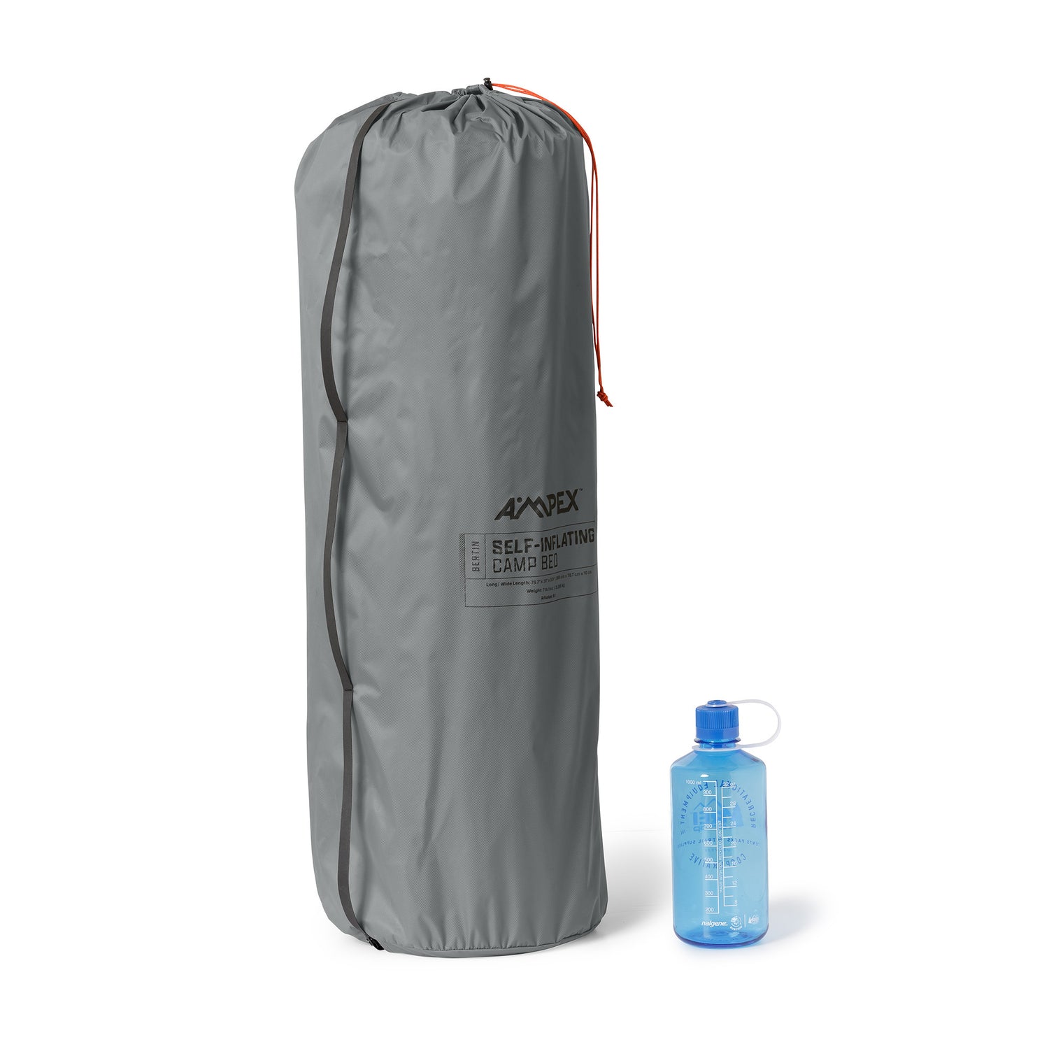 Rolled sleeping pad with Ampex logo packed into a gray stuff sack.