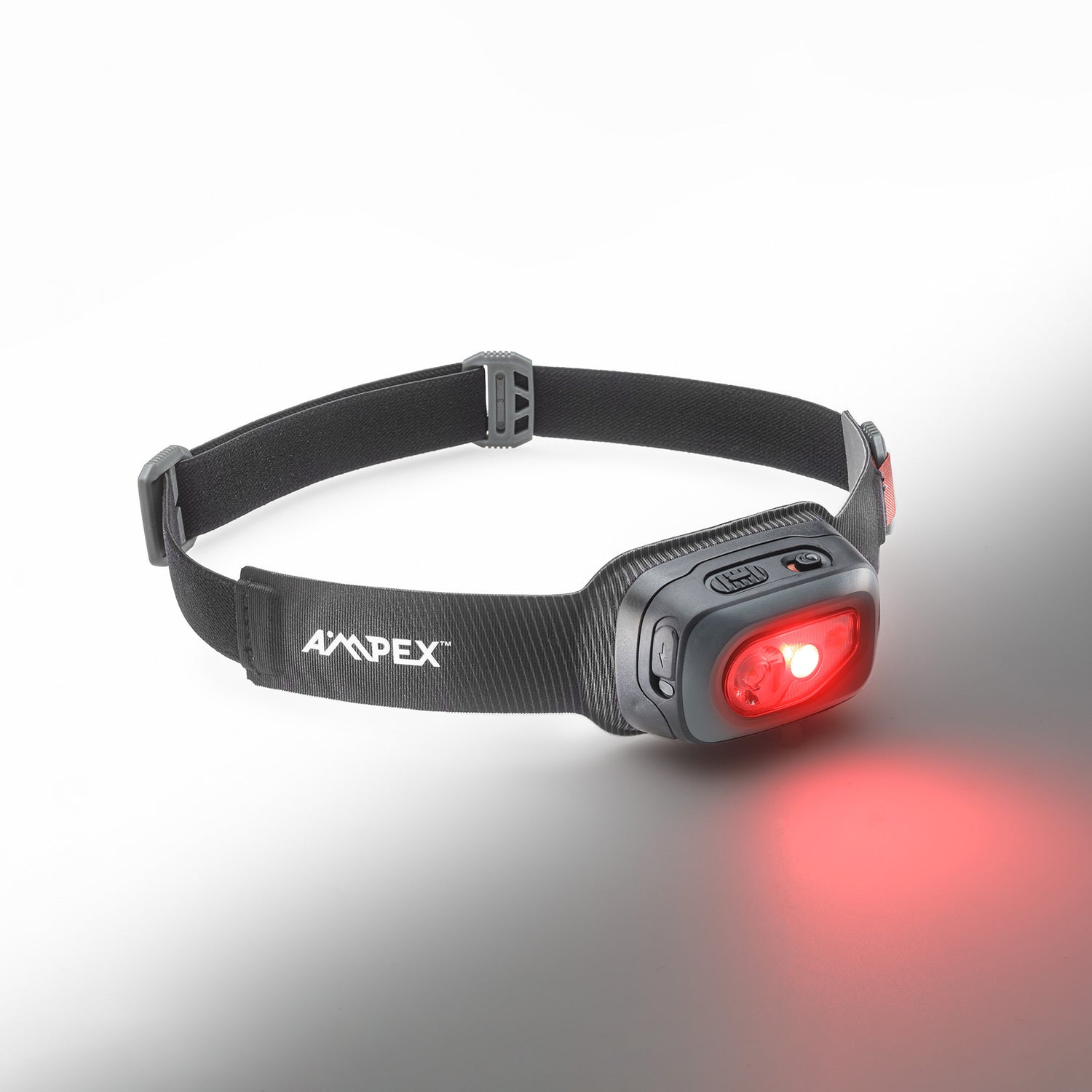 View of the headlamp with red LED turned on, showing the red night vision light.